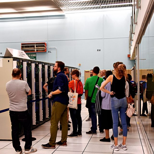 Group learning on a guided tour of a computer center