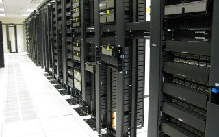 Network aisle with rows of switches
