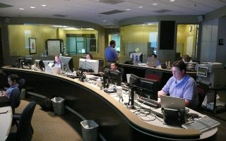 Technicians working in a network operations center